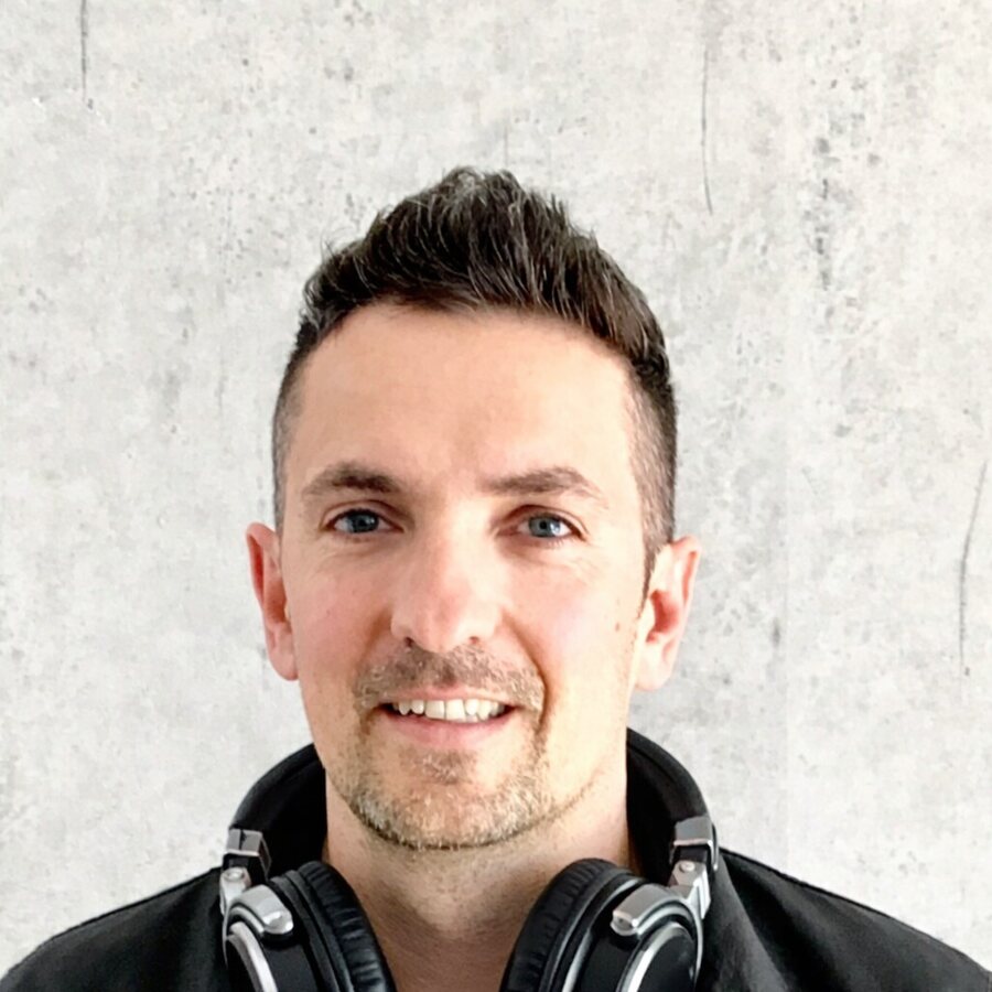 Portrait of DEEP UNIT in a leather jacket with headphones