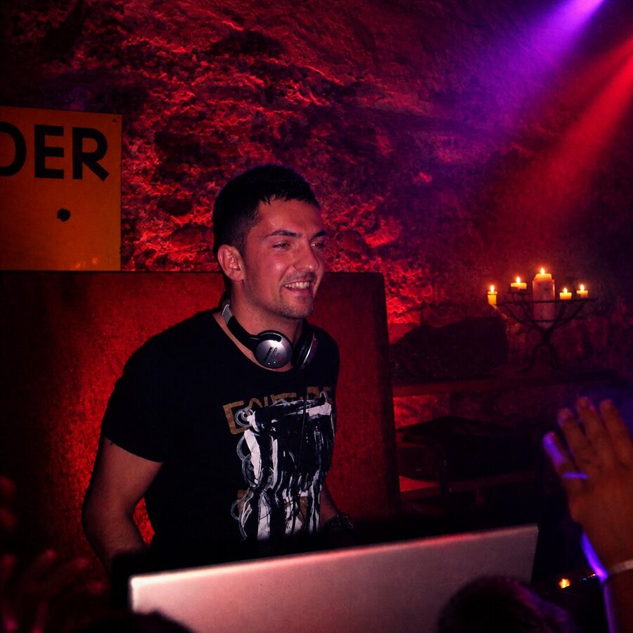 DEEP UNIT playing in a red-lit room
